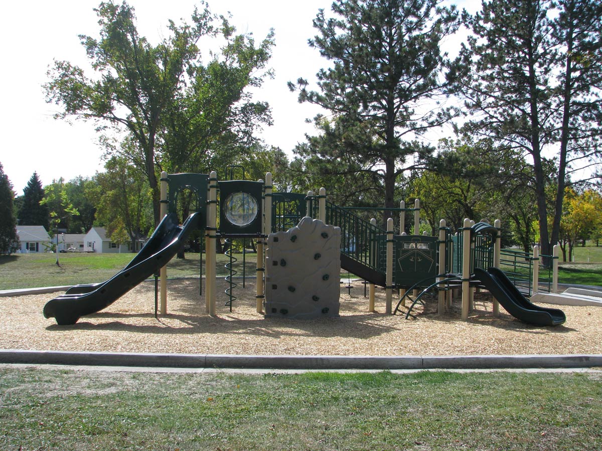 green and tan playground in Lions Park