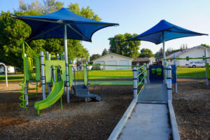 green and blue playground at 23rd Street Park