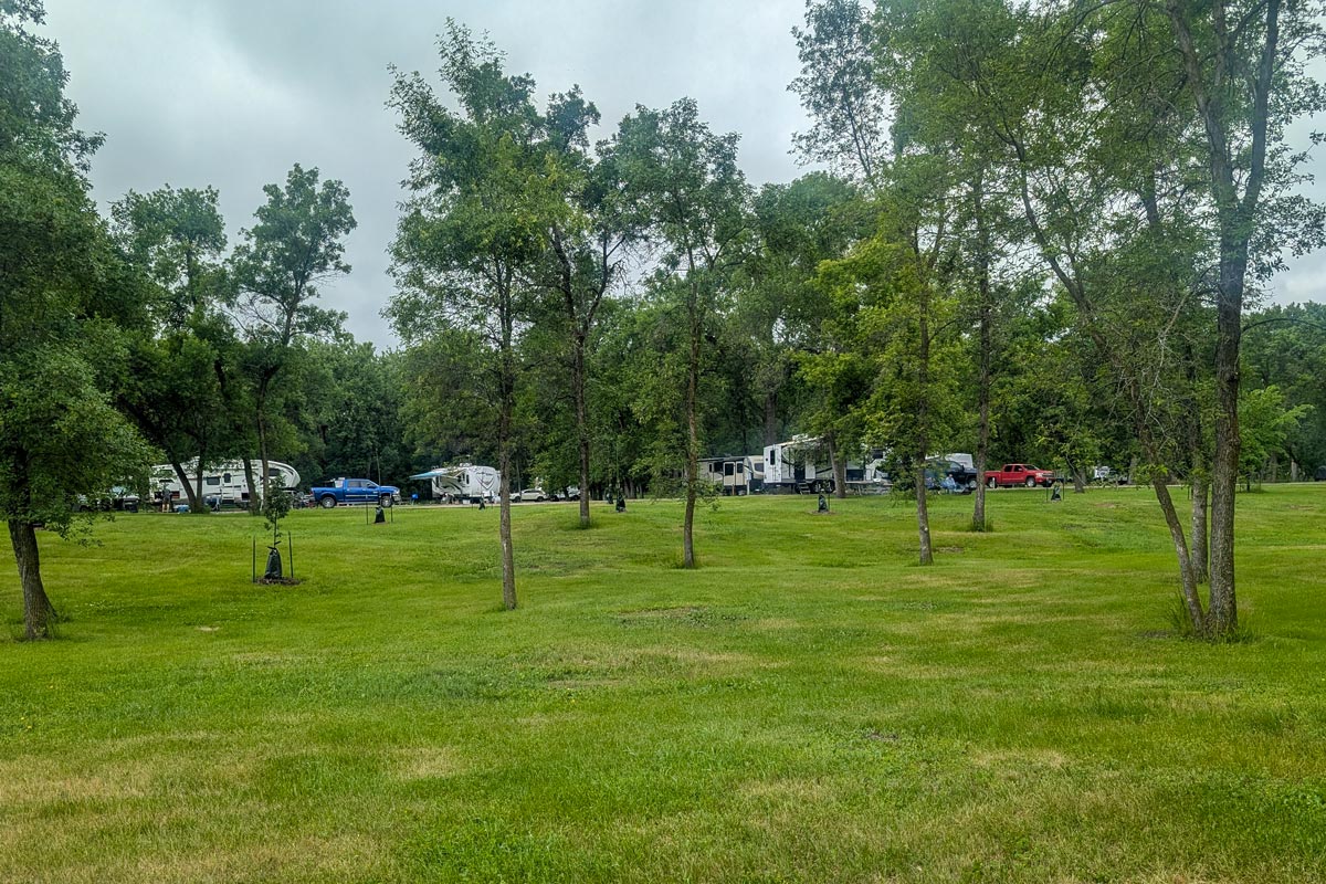 wide angle view of campers parked in a campground
