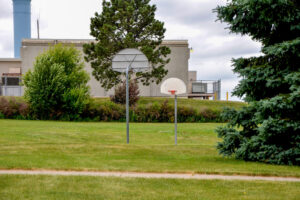 basketball court at Optimist Family Park with two hoops