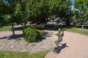 park bench and statue at Peace Park