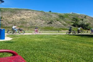 bike riders on the trail at Pioneer Park