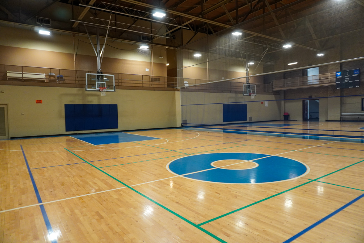 indoor basketball court - looking towards the hoop on one end