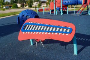 xylophone and other playground equipment in the background