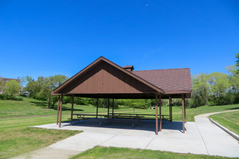 Zonta Park picnic shelter with tables underneath it