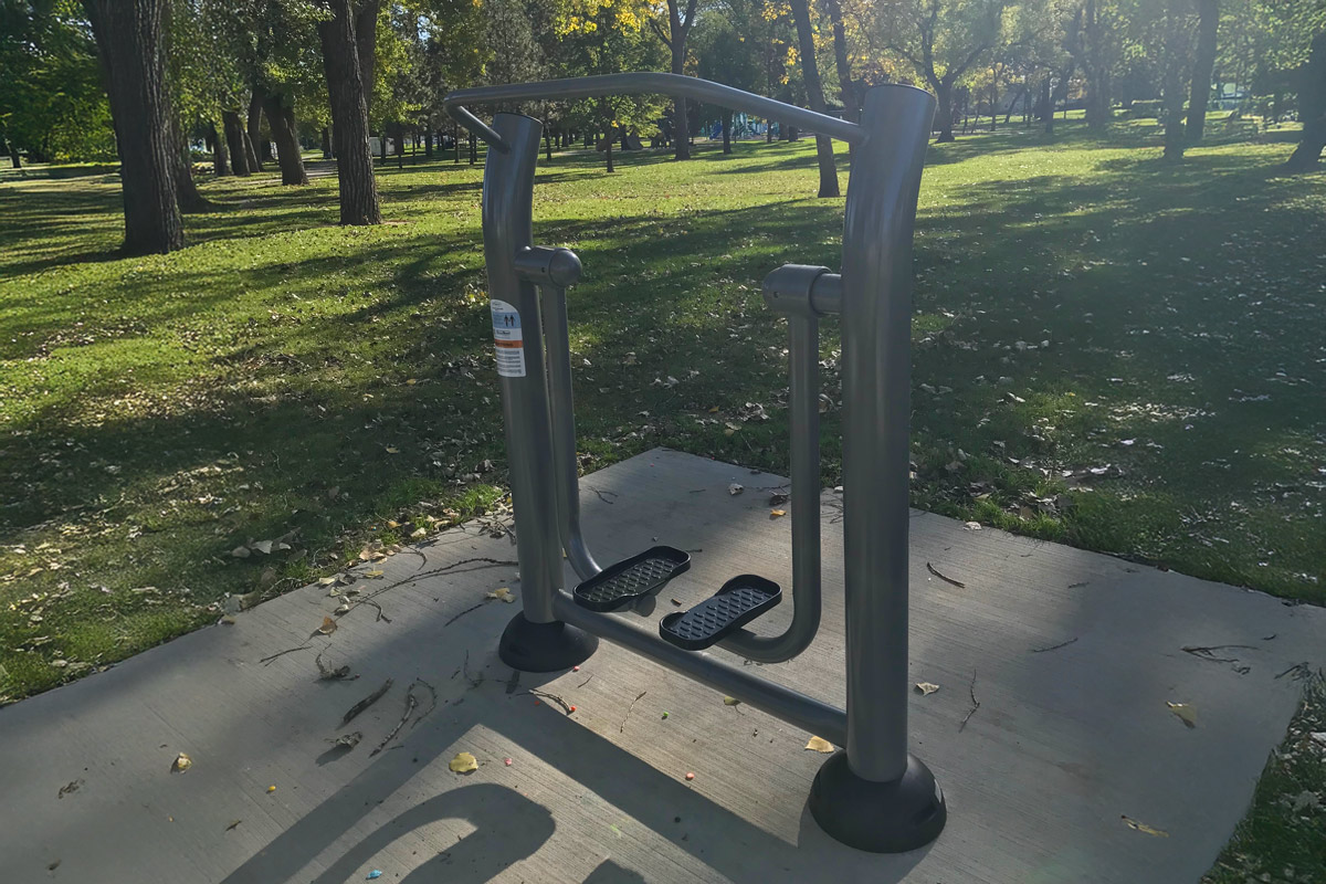 elliptical fitness equipment to work your legs in a park on a fitness trail